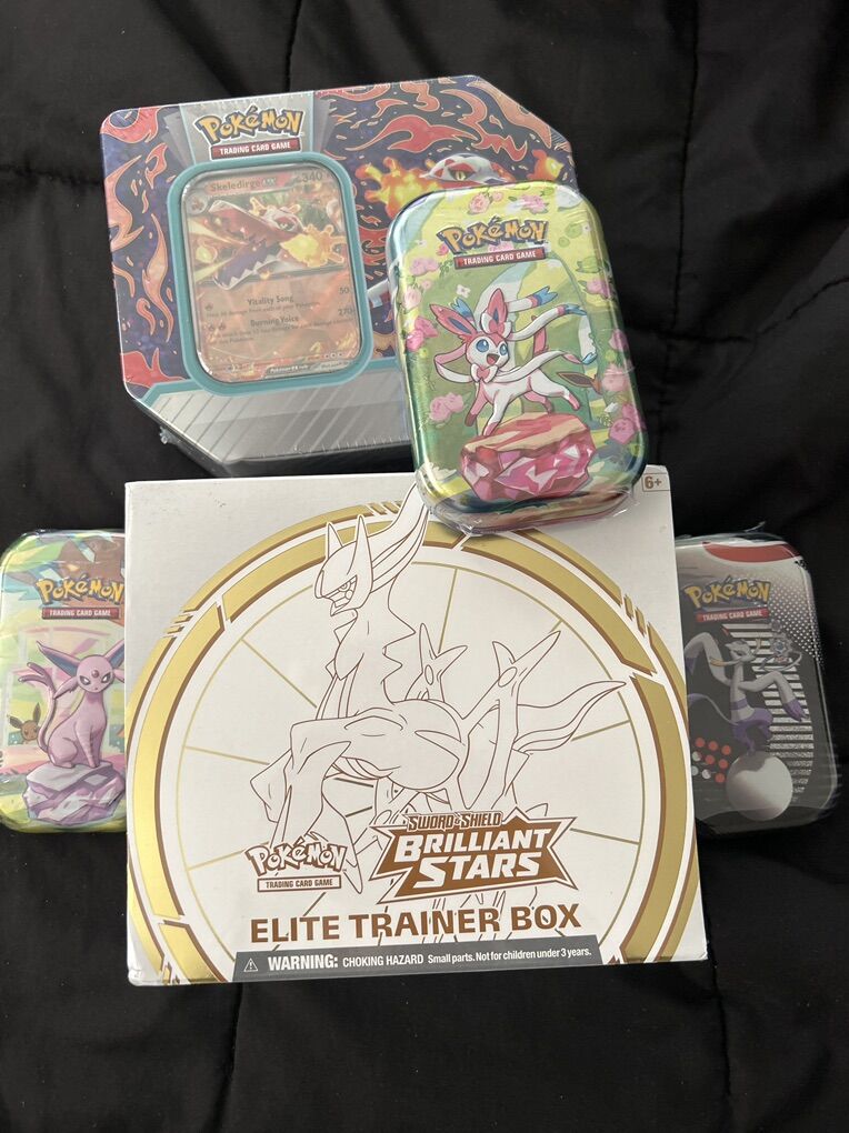 Pokemon ETB Tins