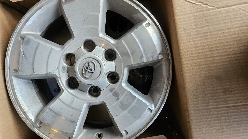 320$ 4 17 inch Toyota wheels.