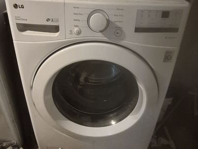 LG 4.5 Cu. Ft. White Front Load Washer & 7.4 Cu. Ft. Vented Electric Dryer Set w/ Sensor Dry