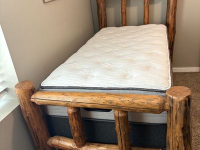 Twin log bed