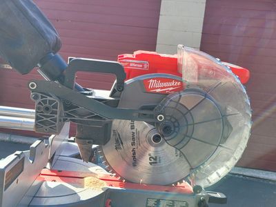 Milwaukee 12-in chop saw with Bosch rolling stand ($650 OBO)
