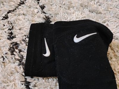 Nike Black White Swoosh Sports Elbow or Knee Pads Athletic Accessory