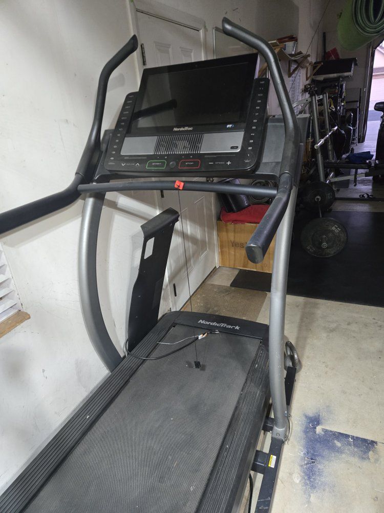 NordicTrack Commercial 1750 Folding Treadmill with iFit & Incline/Decline, has a poltergeist.