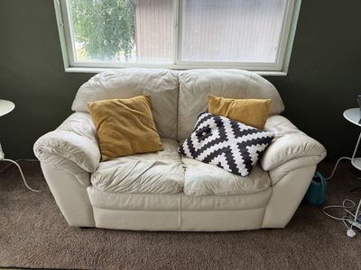 Four piece leather couch set