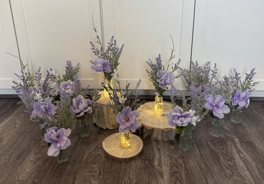 Purple Fliwer Arrangemt In A Tiny Vase