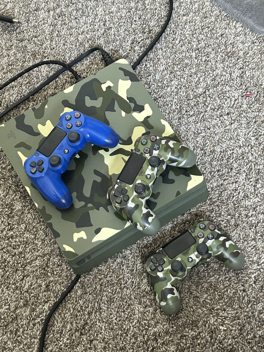 PS4 with 3 controllers and cables