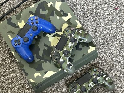 PS4 with 3 controllers and cables