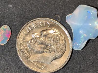 SET OF TWO NATURAL ETHIOPIAN WELO OPAL GEMSTONES.