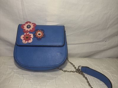 Blue crossbody bag with flowers