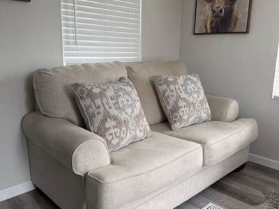 BRAND NEW CREAM COUCH