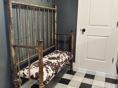 Custom antique cowhide bench