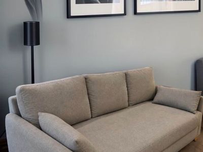 Modern Gray Fabric Sofa with Three Back Cushions and Accent Pillows