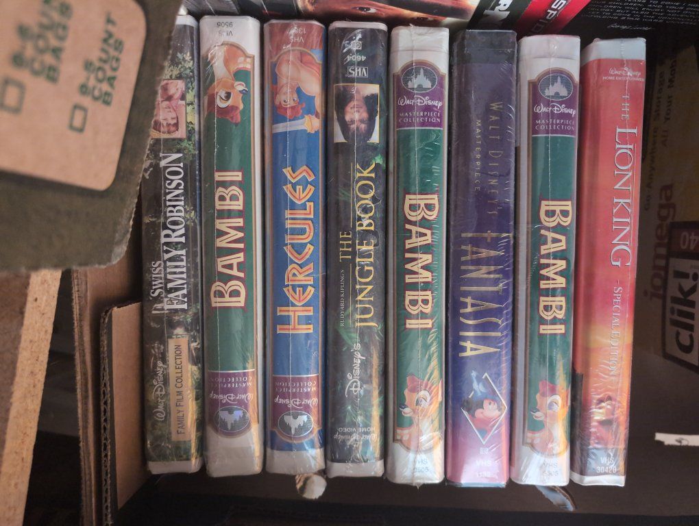 8 VHS Disney tapes with original sealed wrap