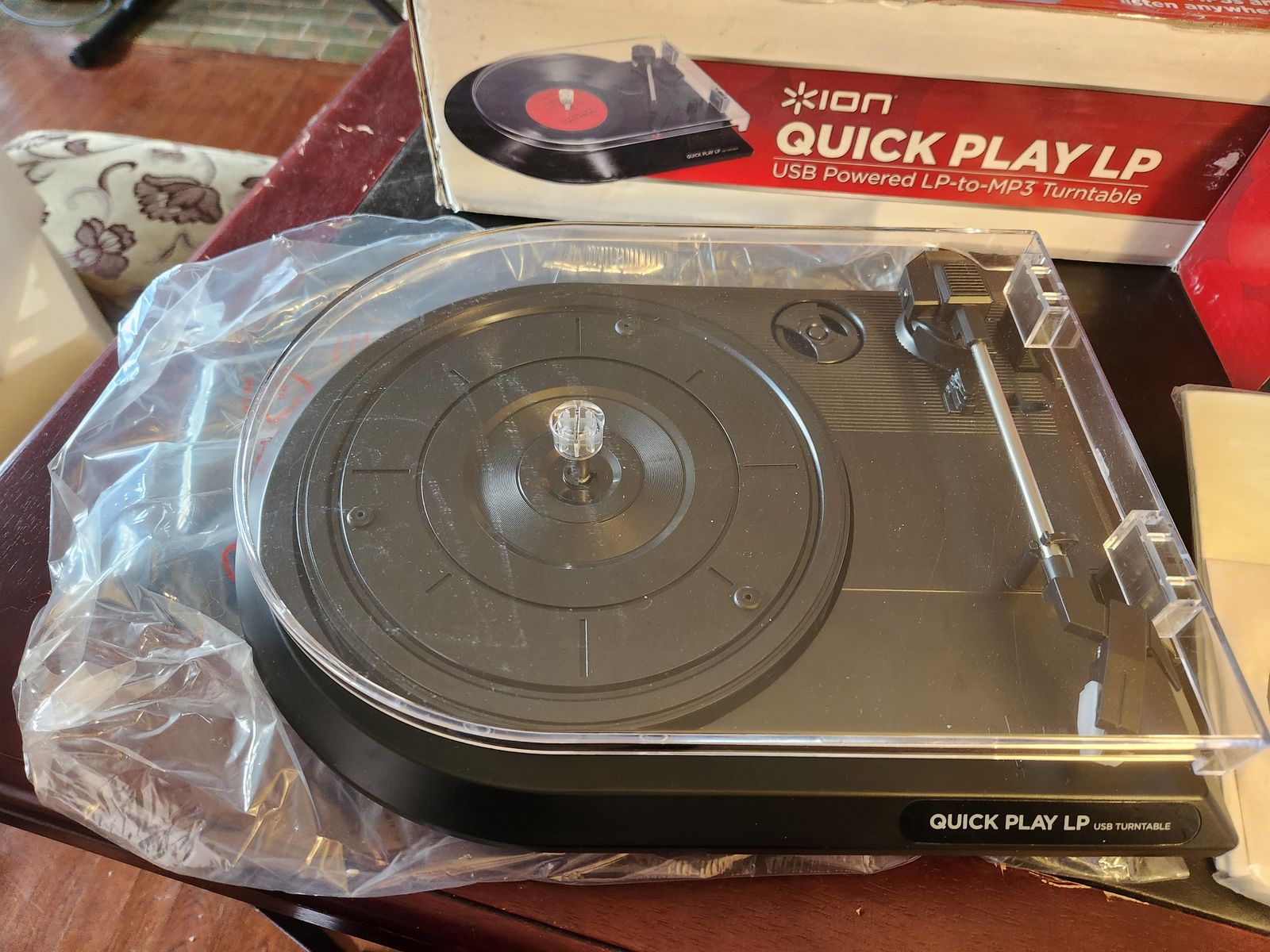 Ion Quick Play LP record player.  Also has USB cable and software to record your albums.