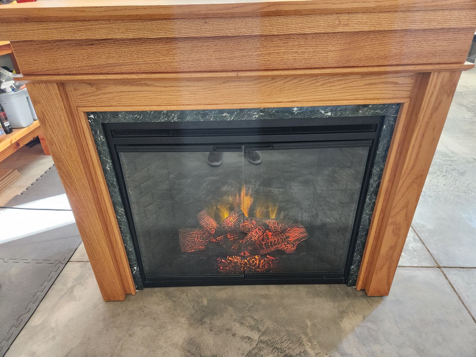 Electric Fireplace with Oak Mantel and Marble Trim