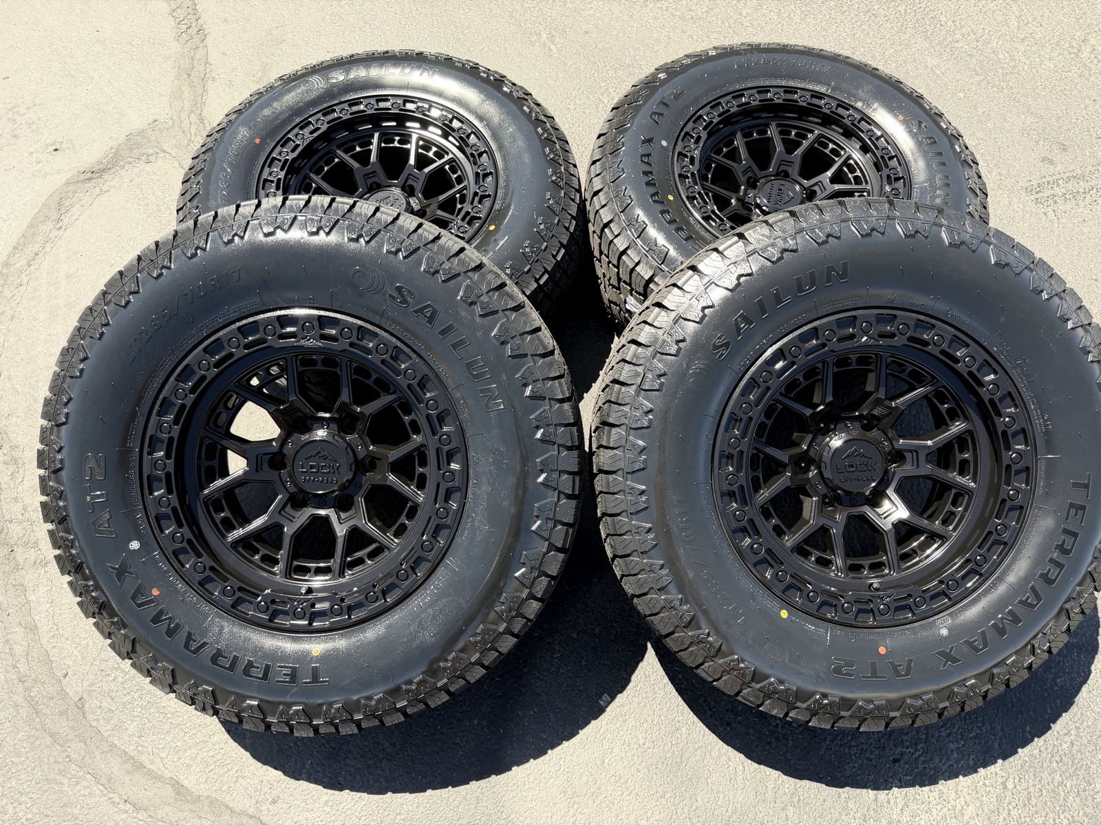 New LT285/70r17 Terramax AT2 Black Lock Commando 6x5.5 6 lug Chevy Silverado 1500 GMC Toyota Tacoma wheels tires 3 peak snow