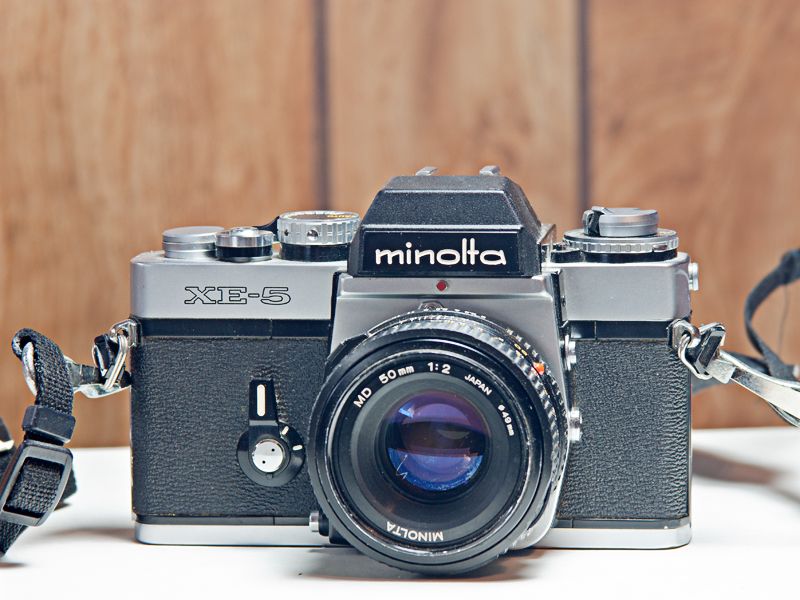 Minolta XE-5 Film Camera w/Minolta MD 50mm f/2 Lens. (49mm Filter Thread.) Strap, No Lens Cap.