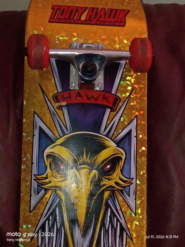 Tony Hawk Skateboard - Golden Eagle Graphic Deck with Red and Blue Wheels, Used