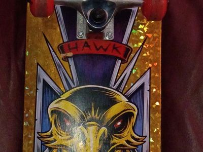 Tony Hawk Skateboard - Golden Eagle Graphic Deck with Red and Blue Wheels, Used