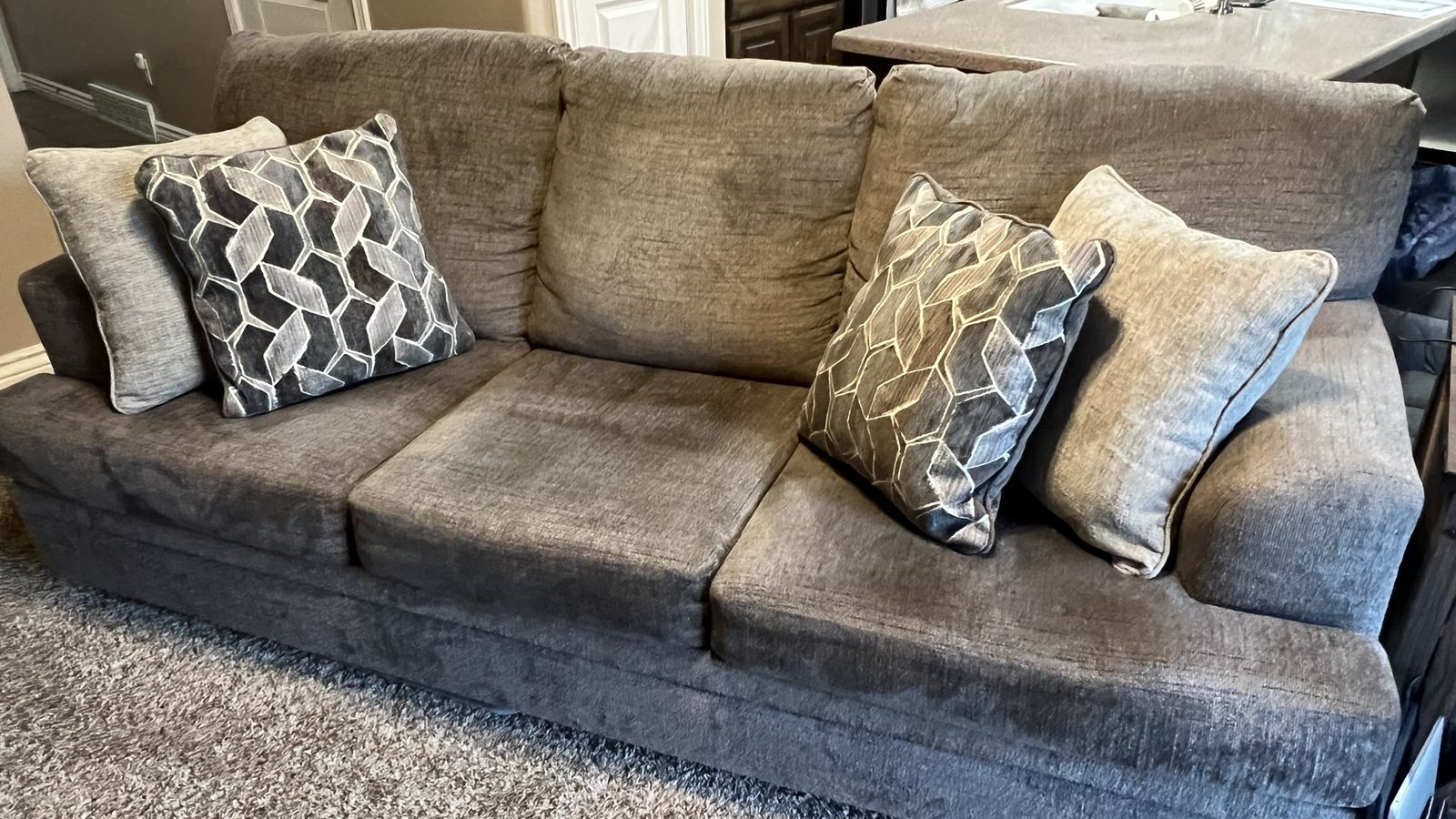 Brown Fabric Three-Cushion Sofa with Accent Pillows