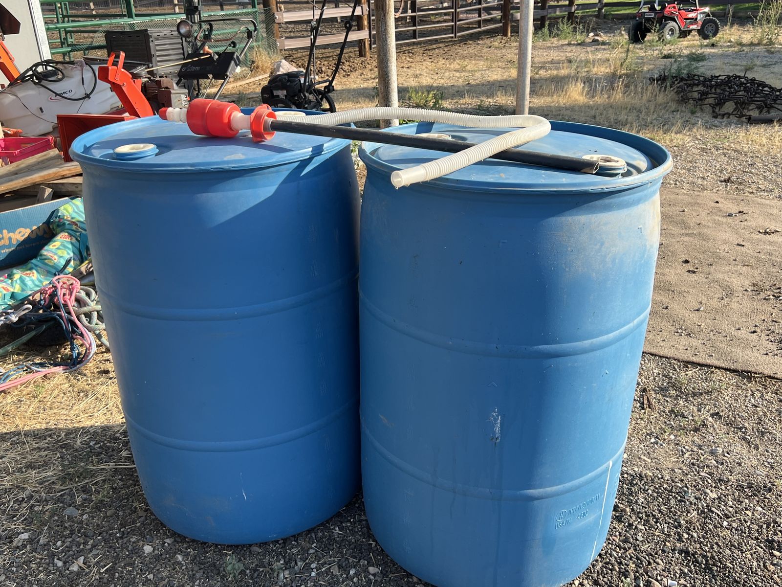 Blue Plastic 55 Gallon Storage Barrels with Manual Hand Siphon Pump