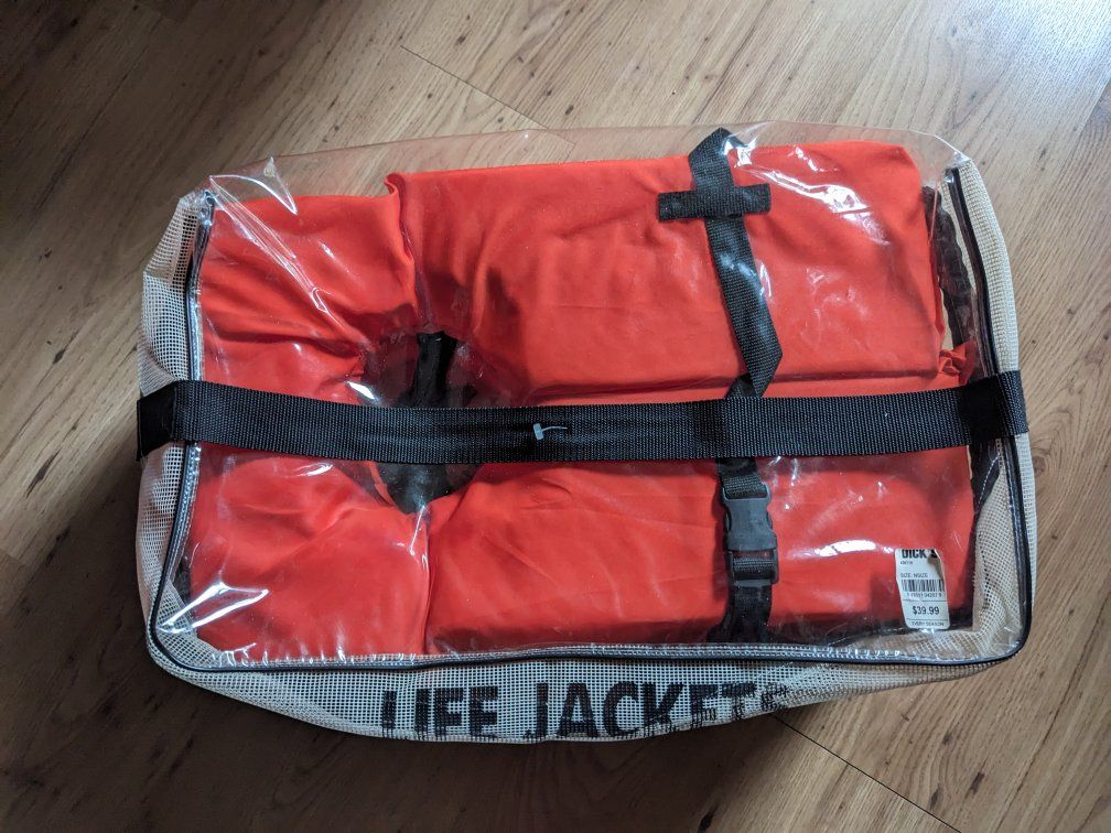 3 lifejackets with bag