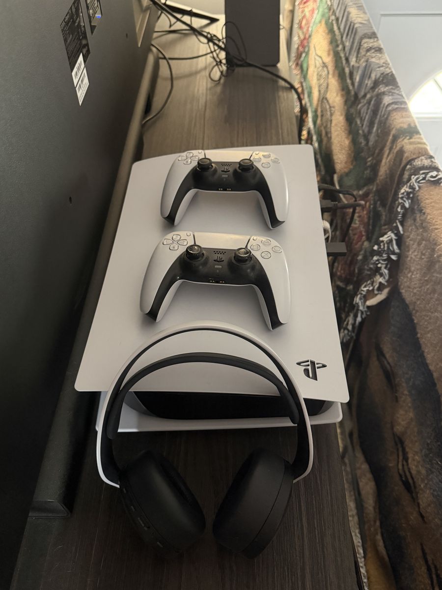 PS5 825G with 2 PlayStation controllers and Play Station headset