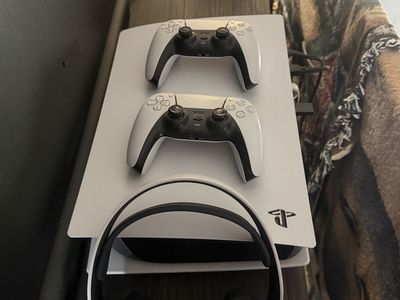 PS5 825G with 2 PlayStation controllers and Play Station headset