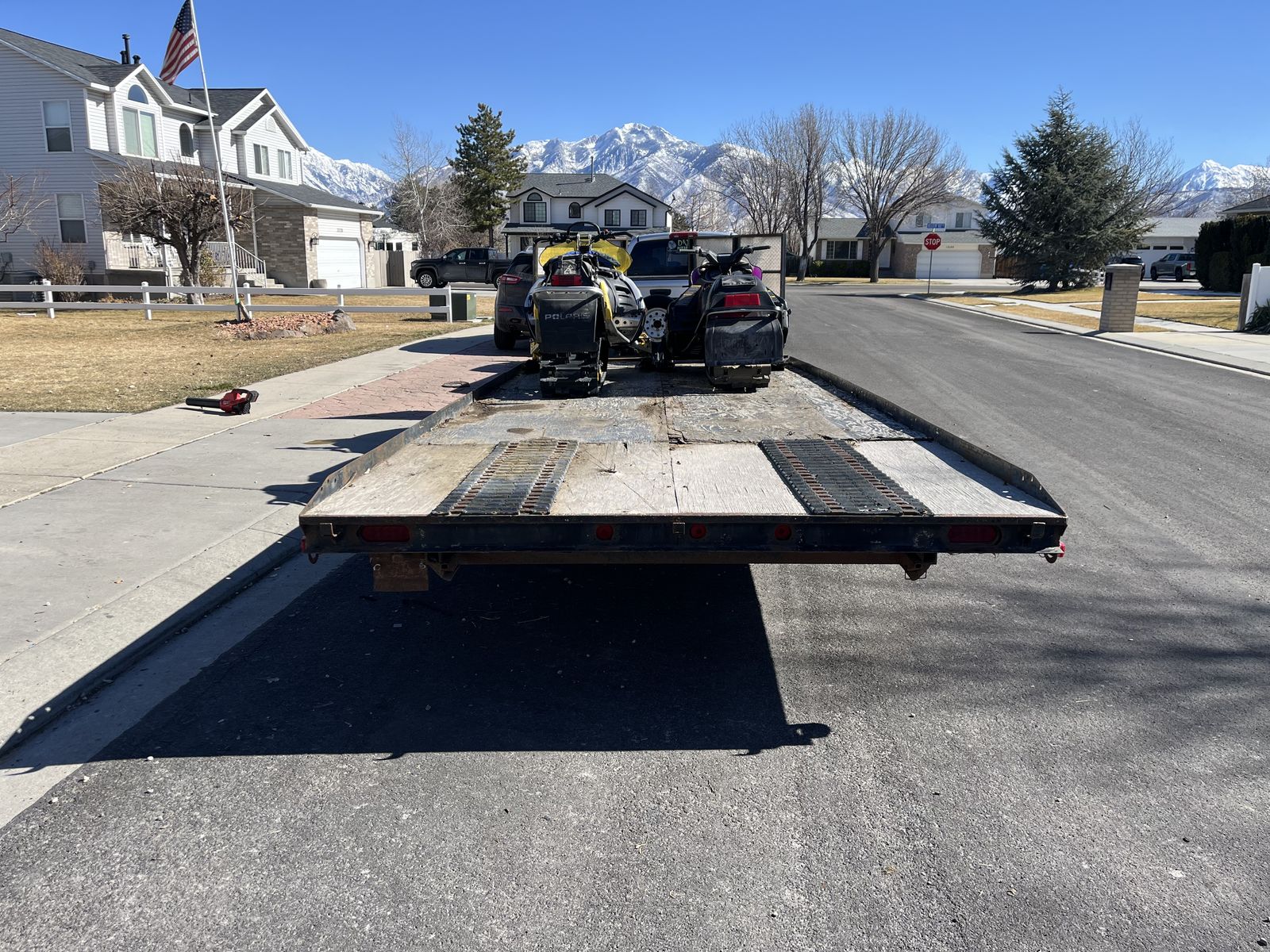 Snowmobiles And Trailer