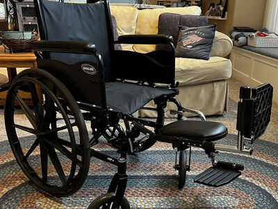 Folding Invacare 9000SL Wheelchair plus separate leg and foot rests