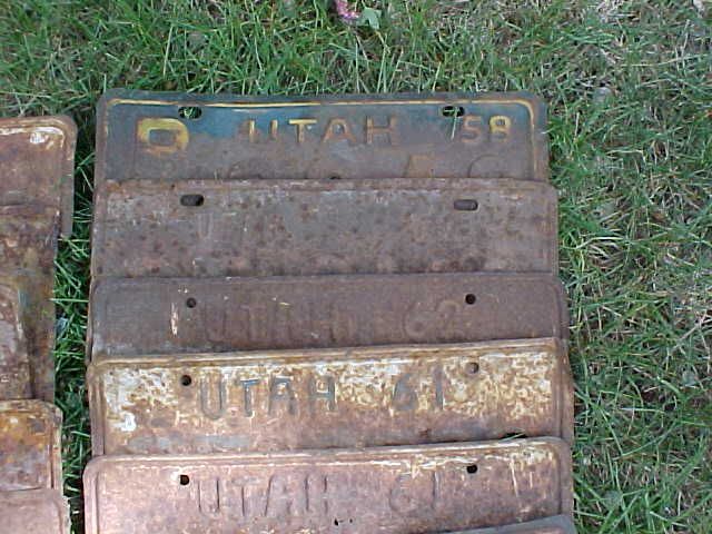 17 old craft  license plates....1956 to 1963 time period...good for craft projects