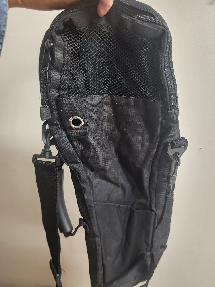 Black Sling Bag with Mesh Pocket and Adjustable Strap/ oxyven carrying bag?