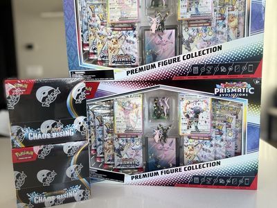 Prismatic evolutions figure collection and chaos rising booster box