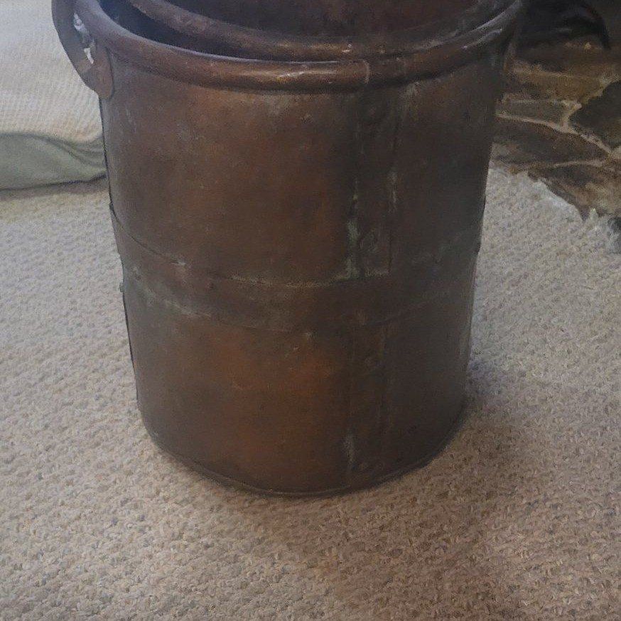 Vintage Hammered Copper Bucket with Handle. 19 inches tall.  Its very heavy. I have a smaller one to that maches