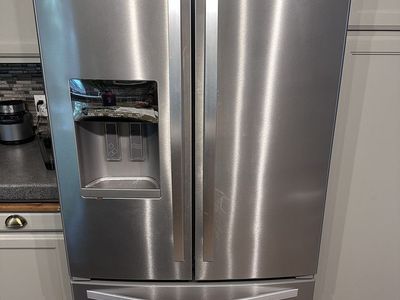 Whirlpool Stainless Steel French Door Refrigerator with Water Dispenser (Ice Maker Needs Repair)