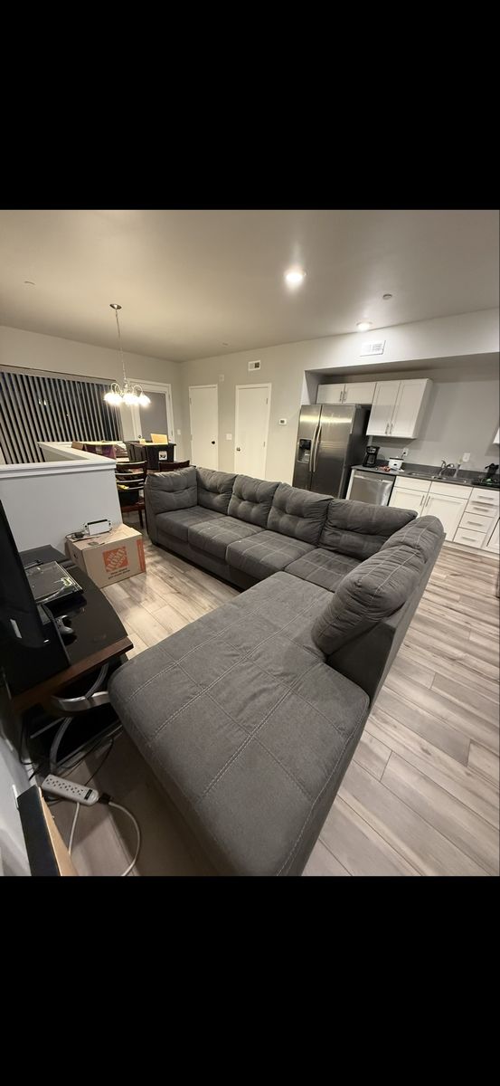 Large grey sectional couch