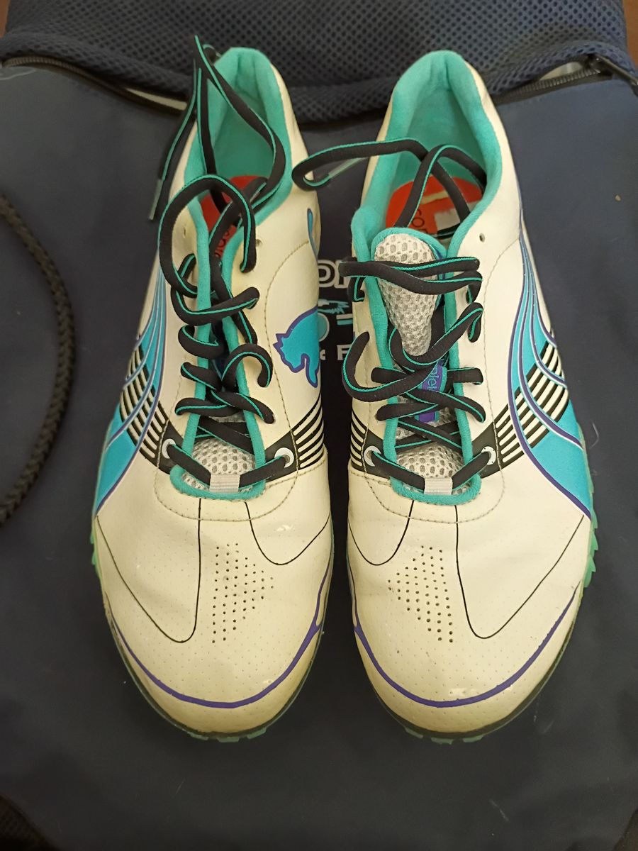 Puma women's cleats with JDCHS Bag