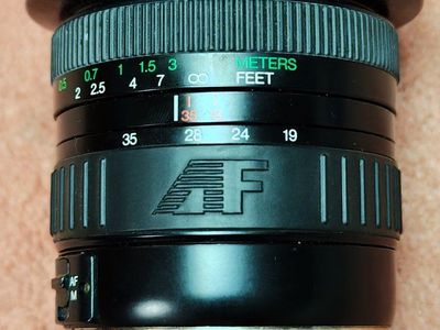 Promaster Spectrum 19-35mm lensLens is in excellent shape and functions 100%. Solid upgrade from the standard 18-55mm Canon kit