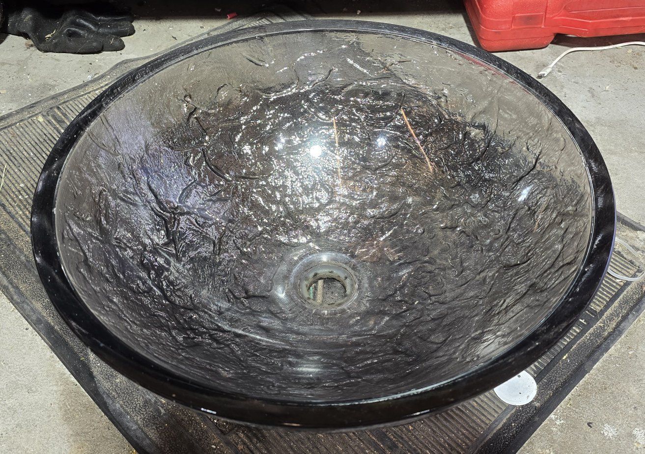Glass countertop sink