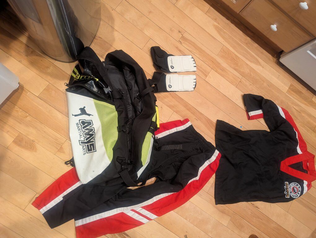 Amy's martial arts bag with kids uniform and glove