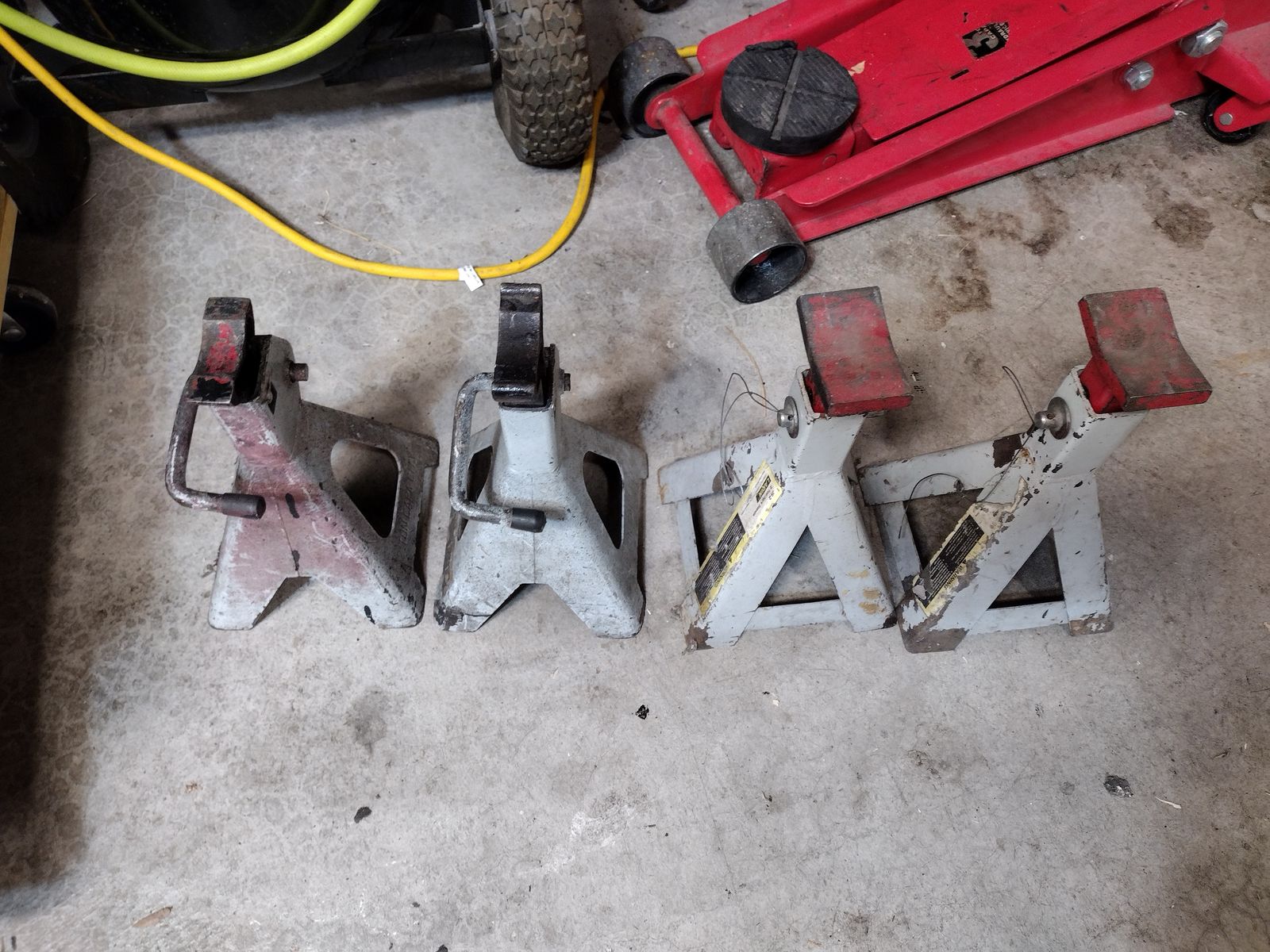 Four used jack stands