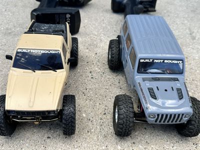 (2) Axial SCX24s With Some Upgrades+Batteries May Trade