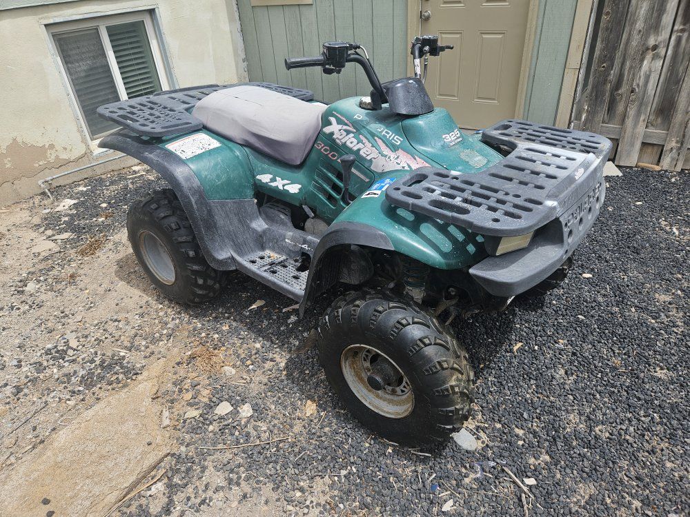 Polaris Xplorer 300 4x4 ATV - Green, Runs Great! Ready for Adventure
