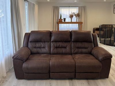 Dark Brown Reclining Sofa with Drop Down Table