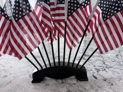 Small US American Flag Tabletop Display with 10 Flags and Black Stand