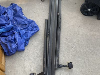 Off-White Wooden Headboard with Metal Bed Frame on Wheels