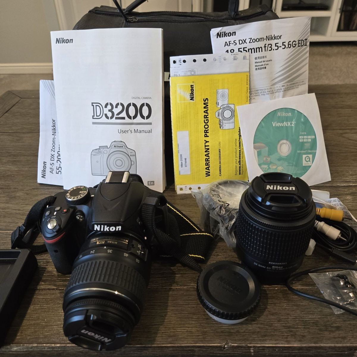 NEAR NEW -  MINT Nikon D3200 DSLR Kit - 24.2MP - 2 Lenses (18-55mm & 55-200mm) + Bag