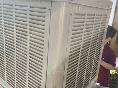 Side draft evaporative cooler