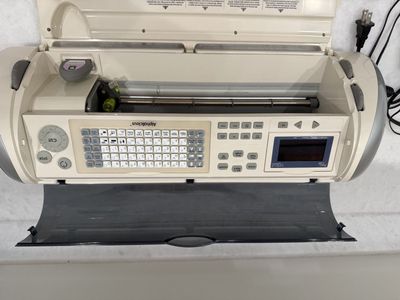 Cricut die cutting machine and accessories