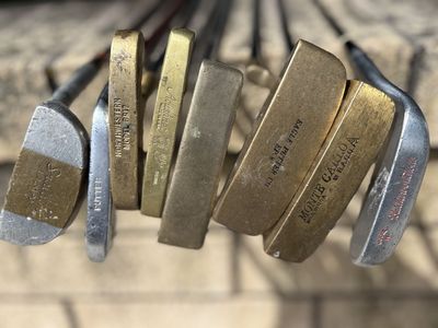 Vintage brass golfing putters. Ping, and other brands Golf